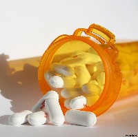 Pills in a prescription bottle (Photos8.com)
