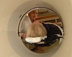 Patient enters a PET scanner (National Institute of Mental Health)