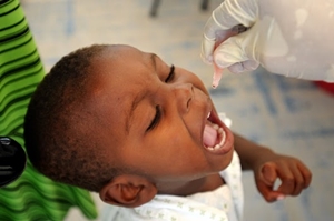 Oral polio vaccine given to child
