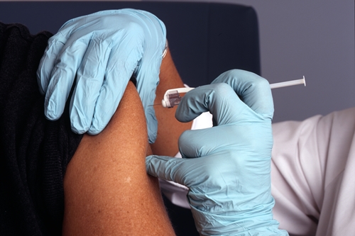 Nurse giving a vaccine