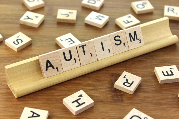 autism spelled in Scrabble tiles