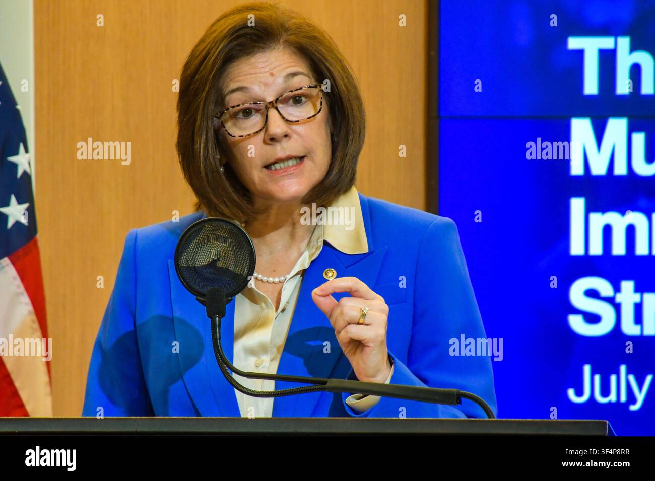 Sen. Catherine Cortez Masto speaking behind a lectern