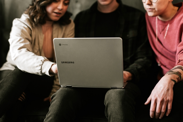 Meeting around a laptop