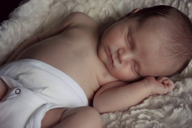Sleeping infant in diaper